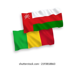 National vector fabric wave flags of Sultanate of Oman and Mali isolated on white background. 1 to 2 proportion.