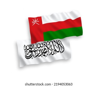 National vector fabric wave flags of Sultanate of Oman and Islamic Emirate of Afghanistan isolated on white background. 1 to 2 proportion.