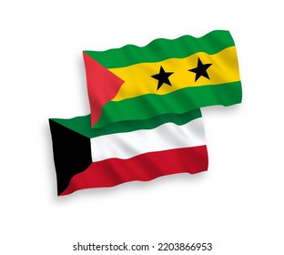 National vector fabric wave flags of Saint Thomas and Prince and Kuwait isolated on white background. 1 to 2 proportion.