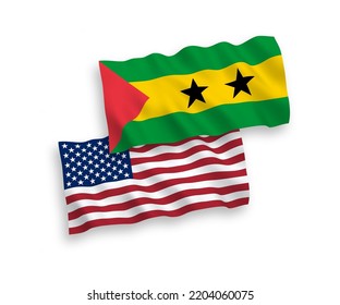 National vector fabric wave flags of Saint Thomas and Prince and USA isolated on white background. 1 to 2 proportion.