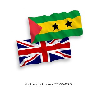 National vector fabric wave flags of Great Britain and Saint Thomas and Prince isolated on white background. 1 to 2 proportion.