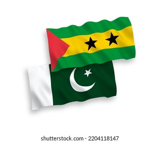 National vector fabric wave flags of Saint Thomas and Prince and Pakistan isolated on white background. 1 to 2 proportion.