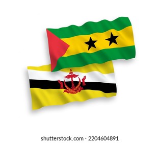 National vector fabric wave flags of Saint Thomas and Prince and Brunei isolated on white background. 1 to 2 proportion.