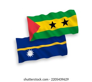 National vector fabric wave flags of Saint Thomas and Prince and Republic of Nauru isolated on white background. 1 to 2 proportion.