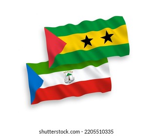 National vector fabric wave flags of Saint Thomas and Prince and Republic of Equatorial Guinea isolated on white background. 1 to 2 proportion.