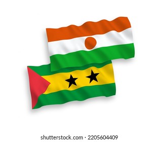 National vector fabric wave flags of Saint Thomas and Prince and Republic of the Niger isolated on white background. 1 to 2 proportion.