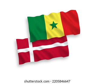 National vector fabric wave flags of Denmark and Republic of Senegal isolated on white background. 1 to 2 proportion.