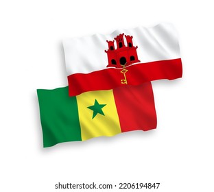 Banderas de olas de tela vectorial nacional de la República del Senegal y Gibraltar aisladas en fondo blanco. de 1 a 2.