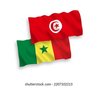 National vector fabric wave flags of Republic of Senegal and Republic of Tunisia isolated on white background. 1 to 2 proportion.