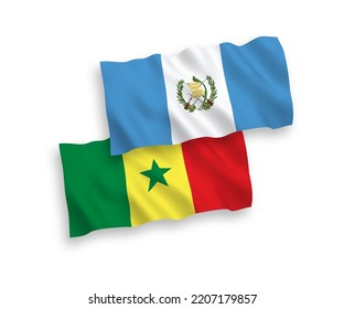 National vector fabric wave flags of Republic of Senegal and Republic of Guatemala isolated on white background. 1 to 2 proportion.