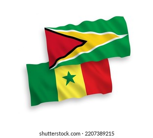 Banderas de olas de tela vectorial nacional de la República del Senegal y de la República Cooperativa de Guyana aisladas de fondo blanco. de 1 a 2.