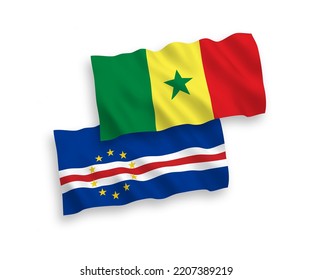 National vector fabric wave flags of Republic of Senegal and Republic of Cabo Verde isolated on white background. 1 to 2 proportion.