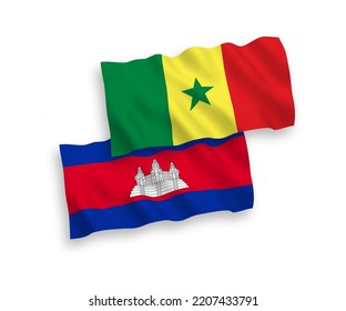 National vector fabric wave flags of Republic of Senegal and Kingdom of Cambodia isolated on white background. 1 to 2 proportion.