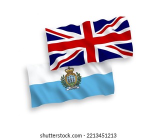 National vector fabric wave flags of Great Britain and San Marino isolated on white background. 1 to 2 proportion.