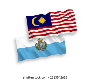 National vector fabric wave flags of San Marino and Malaysia isolated on white background. 1 to 2 proportion.