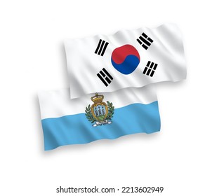 National vector fabric wave flags of South Korea and San Marino isolated on white background. 1 to 2 proportion.