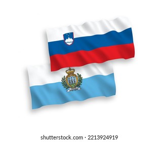 National vector fabric wave flags of Slovenia and San Marino isolated on white background. 1 to 2 proportion.