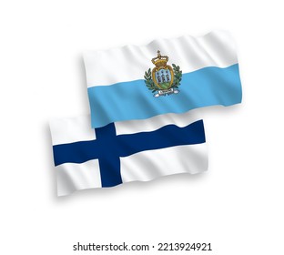National vector fabric wave flags of Finland and San Marino isolated on white background. 1 to 2 proportion.