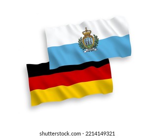 National vector fabric wave flags of Germany and San Marino isolated on white background. 1 to 2 proportion.