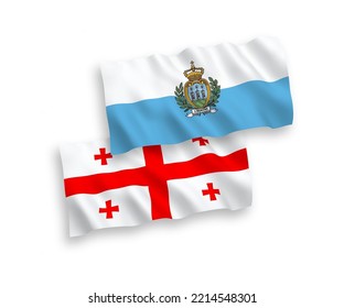 National vector fabric wave flags of San Marino and Georgia isolated on white background. 1 to 2 proportion.