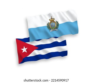 National vector fabric wave flags of San Marino and Cuba isolated on white background. 1 to 2 proportion.