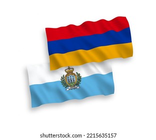 National vector fabric wave flags of San Marino and Armenia isolated on white background. 1 to 2 proportion.