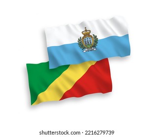 National vector fabric wave flags of San Marino and Republic of the Congo isolated on white background. 1 to 2 proportion.