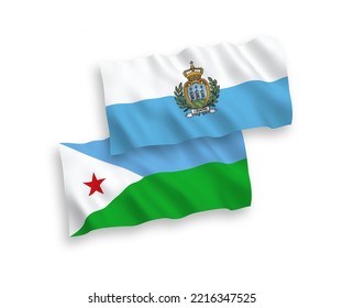 National vector fabric wave flags of San Marino and Republic of Djibouti isolated on white background. 1 to 2 proportion.