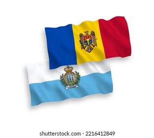 National vector fabric wave flags of San Marino and Moldova isolated on white background. 1 to 2 proportion.