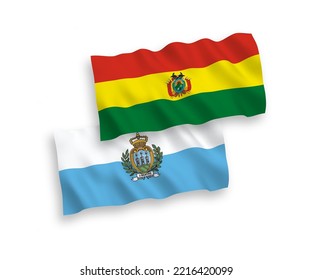 National vector fabric wave flags of San Marino and Bolivia isolated on white background. 1 to 2 proportion.