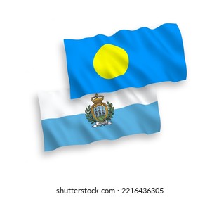 National vector fabric wave flags of San Marino and Palau isolated on white background. 1 to 2 proportion.