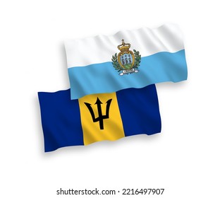 National vector fabric wave flags of San Marino and Barbados isolated on white background. 1 to 2 proportion.