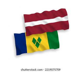 Banderas de ondulación de tela vectorial nacional de Letonia y San Vicente y las Granadinas aisladas en fondo blanco. de 1 a 2.