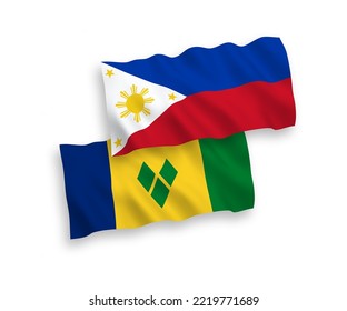 National vector fabric wave flags of Saint Vincent and the Grenadines and Philippines isolated on white background. 1 to 2 proportion.