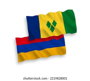 National vector fabric wave flags of Saint Vincent and the Grenadines and Armenia isolated on white background. 1 to 2 proportion.
