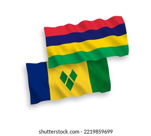 National vector fabric wave flags of Saint Vincent and the Grenadines and Republic of Mauritius isolated on white background. 1 to 2 proportion.