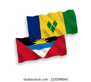 National vector fabric wave flags of Saint Vincent and the Grenadines and Antigua and Barbuda isolated on white background. 1 to 2 proportion.