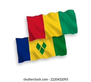 Nationale Vektor-Wellen-Flaggen von St. Vincent und die Grenadinen und Guinea einzeln auf weißem Hintergrund. 1 bis 2 %.