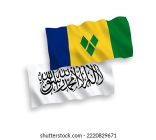 National vector fabric wave flags of Saint Vincent and the Grenadines and Islamic Emirate of Afghanistan isolated on white background. 1 to 2 proportion.