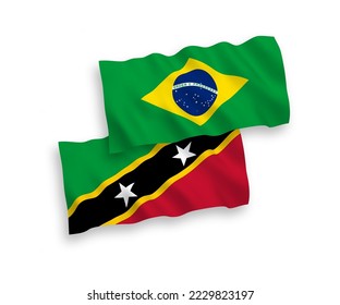 Banderas de olas de tela vectorial nacional del Brasil y la Federación de Saint Christopher y Nevis aisladas en fondo blanco. de 1 a 2.