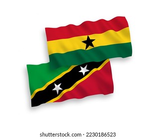 National vector fabric wave flags of Federation of Saint Christopher and Nevis and Ghana isolated on white background. 1 to 2 proportion.