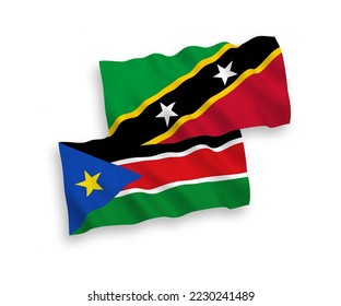 National vector fabric wave flags of Federation of Saint Christopher and Nevis and Republic of South Sudan isolated on white background. 1 to 2 proportion.