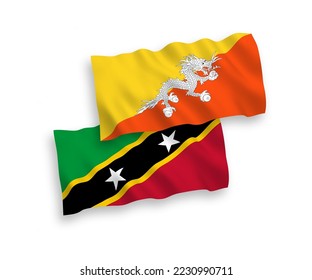 National vector fabric wave flags of Federation of Saint Christopher and Nevis and Kingdom of Bhutan isolated on white background. 1 to 2 proportion.