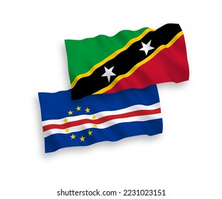 National vector fabric wave flags of Federation of Saint Christopher and Nevis and Republic of Cabo Verde isolated on white background. 1 to 2 proportion.