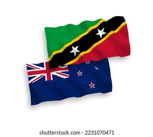National vector fabric wave flags of Federation of Saint Christopher and Nevis and New Zealand isolated on white background. 1 to 2 proportion.