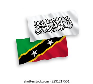 National vector fabric wave flags of Federation of Saint Christopher and Nevis and Islamic Emirate of Afghanistan isolated on white background. 1 to 2 proportion.