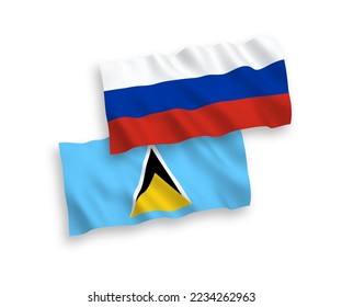 Banderas de olas de tela vectorial nacional de Santa Lucía y Rusia aisladas en fondo blanco. de 1 a 2.