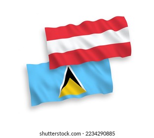 National vector fabric wave flags of Austria and Saint Lucia isolated on white background. 1 to 2 proportion.