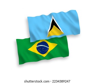 National vector fabric wave flags of Brazil and Saint Lucia isolated on white background. 1 to 2 proportion.