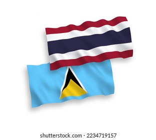 National vector fabric wave flags of Saint Lucia and Thailand isolated on white background. 1 to 2 proportion.